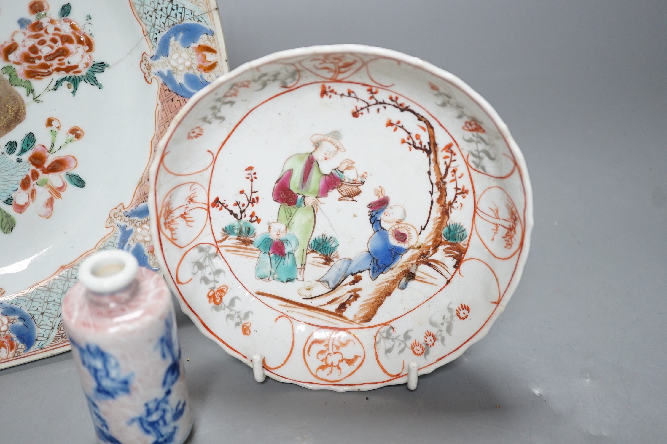 An 18th century Chinese export octagonal dish, a similar saucer and an underglaze blue and red snuff bottle